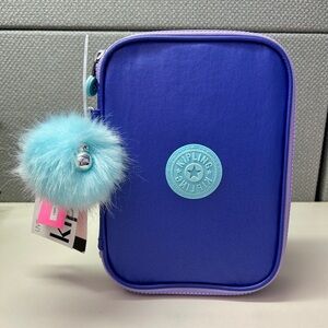 Kipling 100 Pens Case in the "Cosmic Metallic" color.